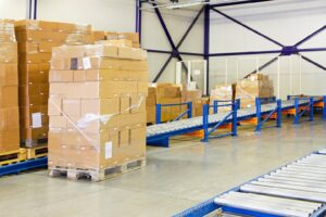 Erweiterte Gewerbesteuerkürzung bei Mitvermietung: Paletten-Förderanlagen im Fokus